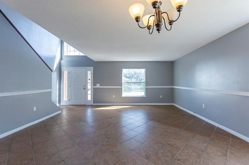 5821 WINDRIDGE DRIVE, WINTER HAVEN, Florida 33881, 5 Bedrooms Bedrooms, ,3 BathroomsBathrooms,Residential,For Sale,WINDRIDGE,O6007783