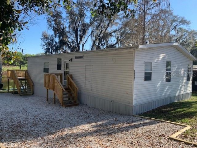 8937 GOLDEN GATE BOULEVARD, POLK CITY, Florida 33868, 2 Bedrooms Bedrooms, ,2 BathroomsBathrooms,Residential,For Sale,GOLDEN GATE,L4928394