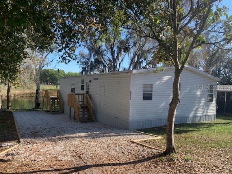 8937 GOLDEN GATE BOULEVARD, POLK CITY, Florida 33868, 2 Bedrooms Bedrooms, ,2 BathroomsBathrooms,Residential,For Sale,GOLDEN GATE,L4928394