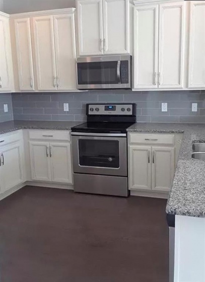 15214 SUNRISE GROVE COURT, WINTER GARDEN, Florida 34787, 3 Bedrooms Bedrooms, ,2 BathroomsBathrooms,Residential,For Sale,SUNRISE GROVE,O6003016